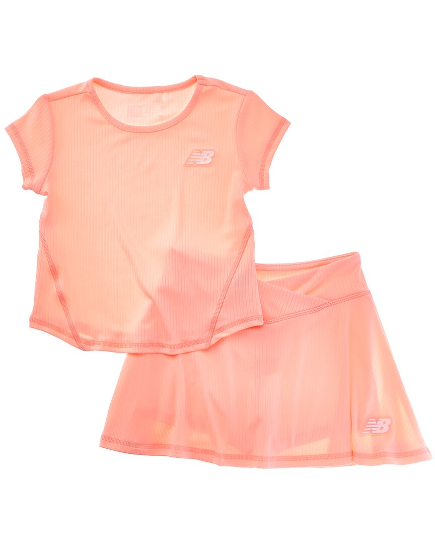 

Комплект New Balance из двух предметов: футболка в рубчик и самокат, розовый