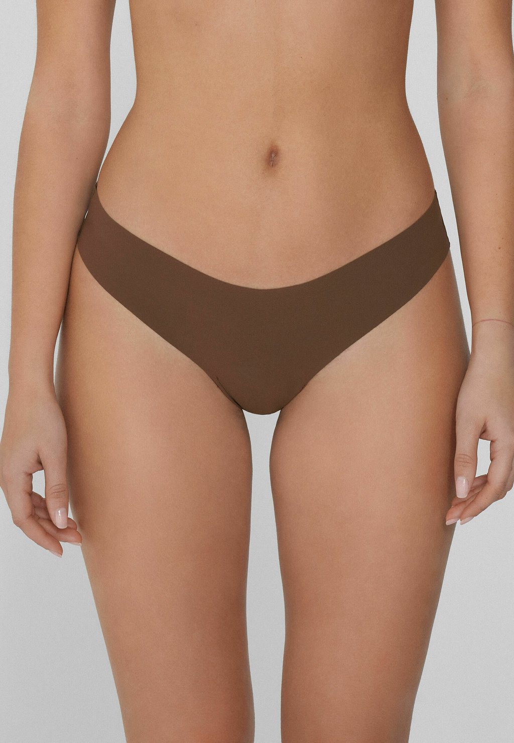 

Стринги MIT HOHEM BEINAUSSCHNITT AUS NAHTLOS VERARBEITETER Tezenis, медный