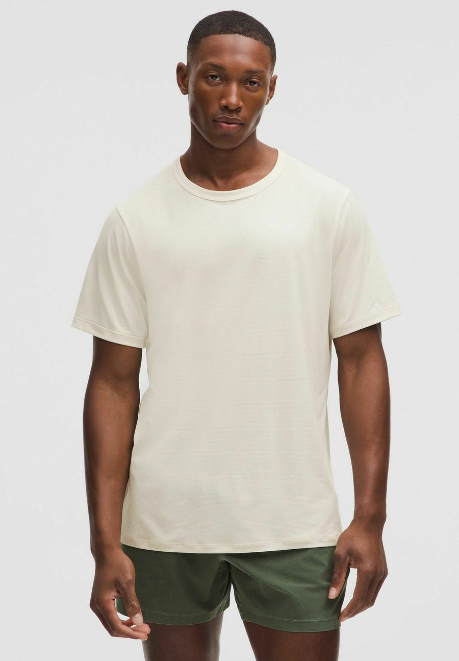 

Спортивная футболка lululemon Mile Maker Lightweight Short Sleeve, Light Ivory/White