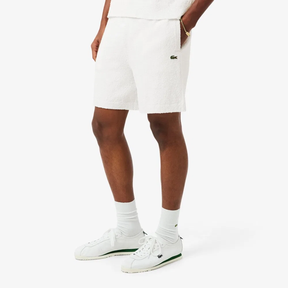 Мужские хлопковые шорты свободного кроя молочного цвета от Lacoste — фото 2