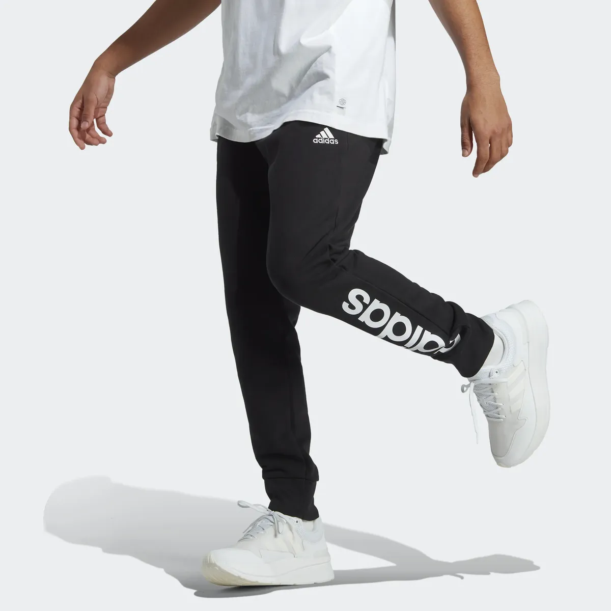 

Adidas Sportswear спортивные брюки "ESSENTIALS FRENCH TERRY TAPERED CUFF LOGO PANTS" (1 шт.), черный