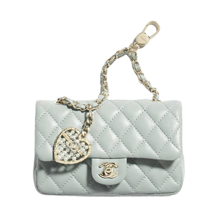 

CHANEL Миниатюрный кошелек из овчины женский светло-зеленый