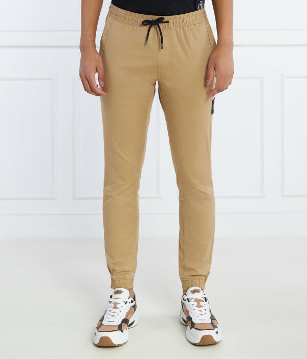 

Брюки-Джоггеры Skinny fit Calvin Klein Jeans, коричневый
