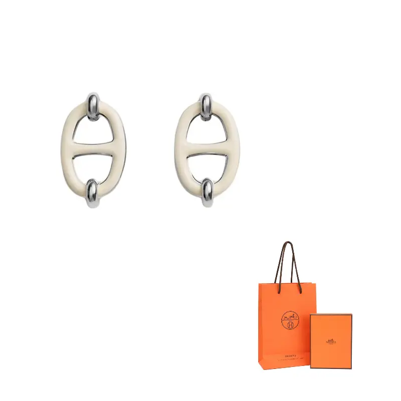 

HERMES Позолоченные металлические серьги для женщин Cream