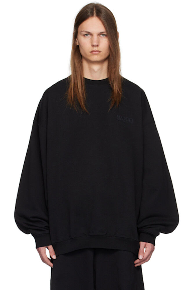 

Черная толстовка с вышитым логотипом VETEMENTS