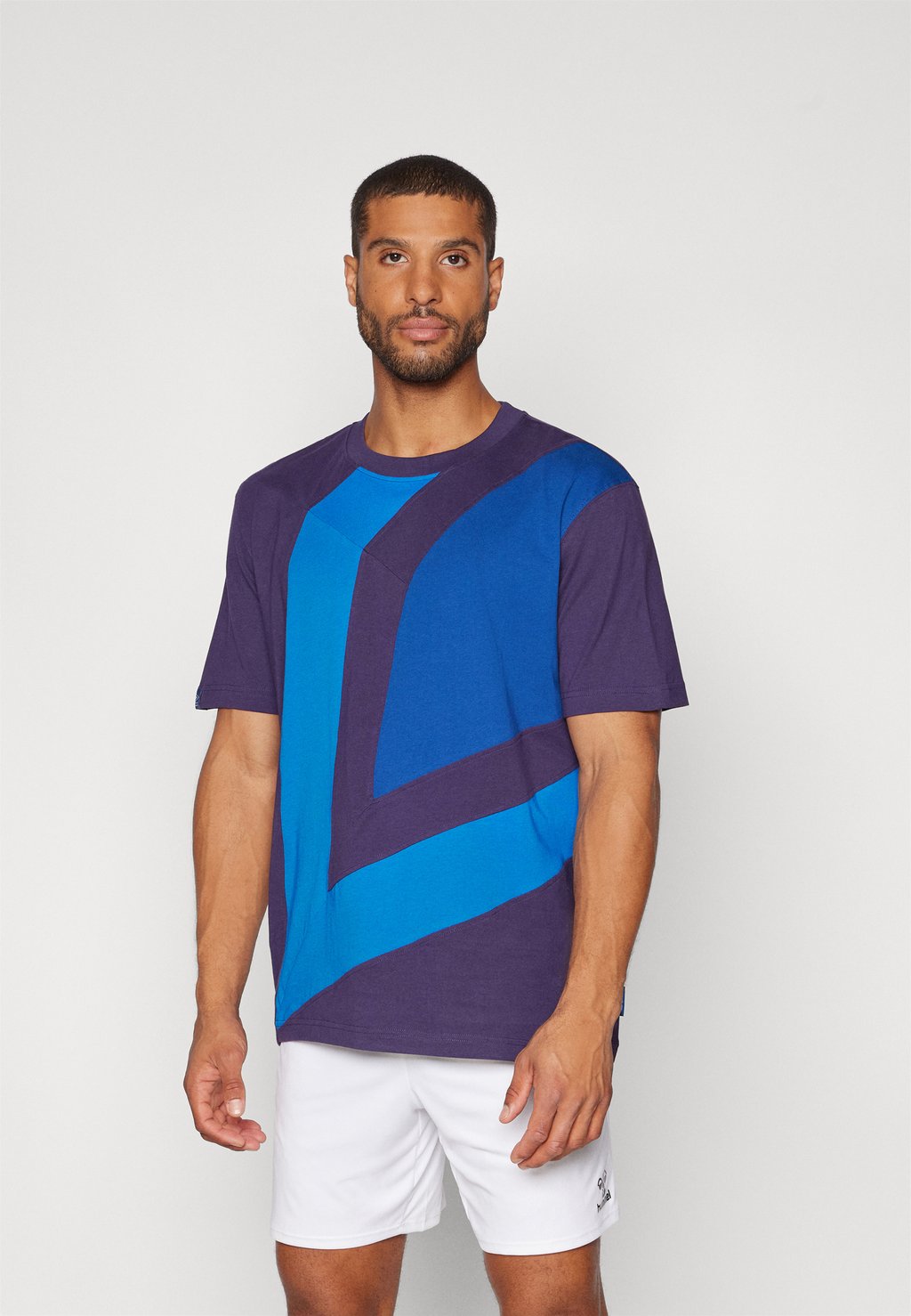 

Футболка с принтом DIAGONAL DIAMOND TEE Umbro, фиолетовый