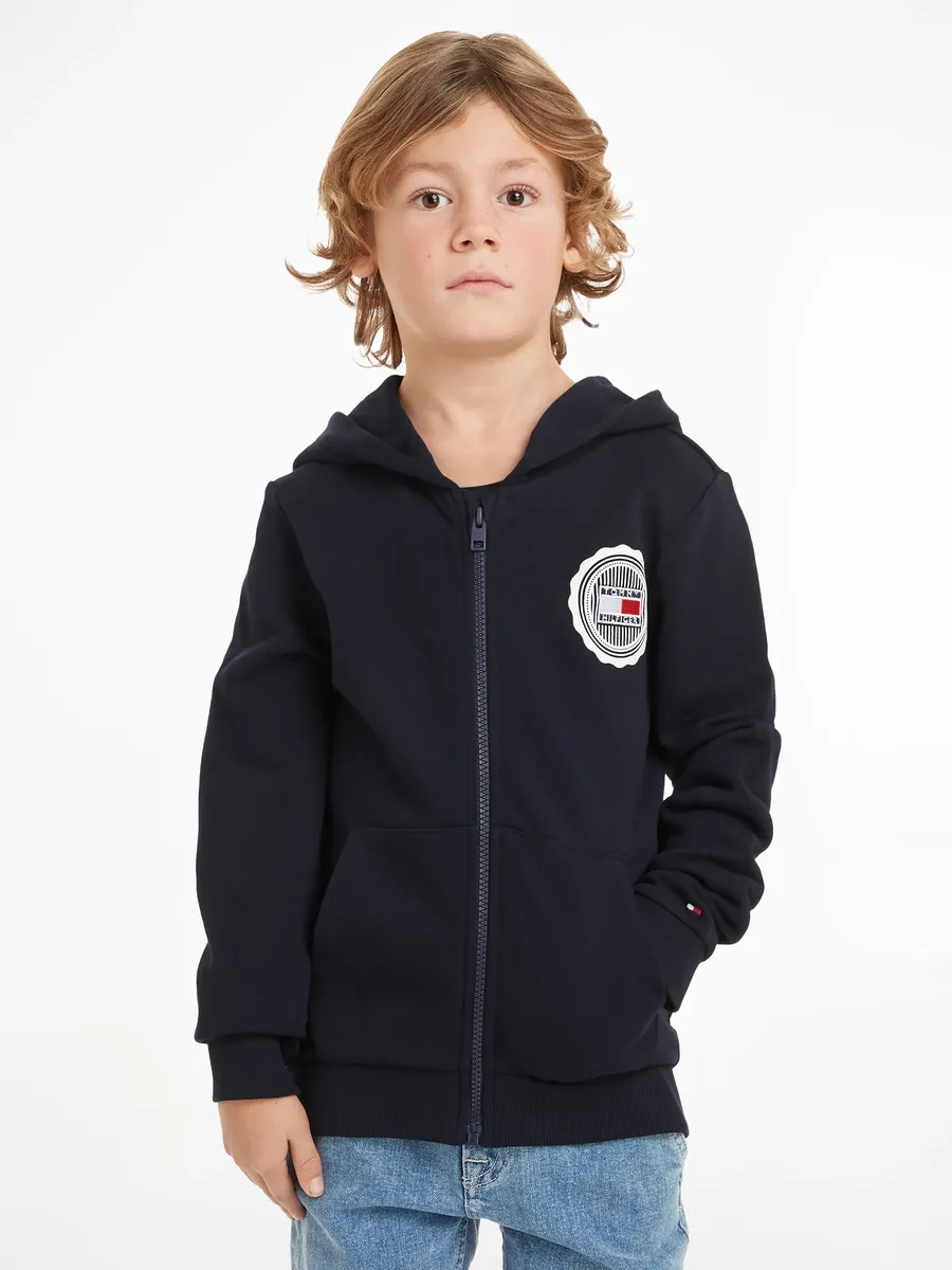 

Толстовка Tommy Hilfiger "STAMP TOWELING REG ZIPUP HOODIE", детская до 16 лет, с нашивкой-логотипом, цвет Desert Sky
