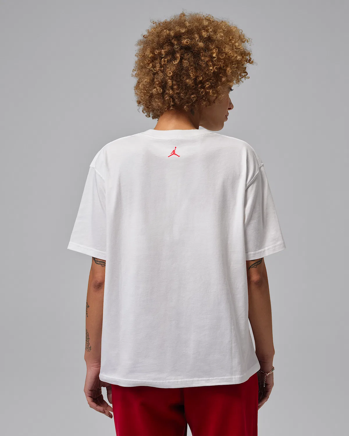 Женская футболка Dri-FIT с принтом Jordan Sport Heritage, White/Infrared 23 — фото 2
