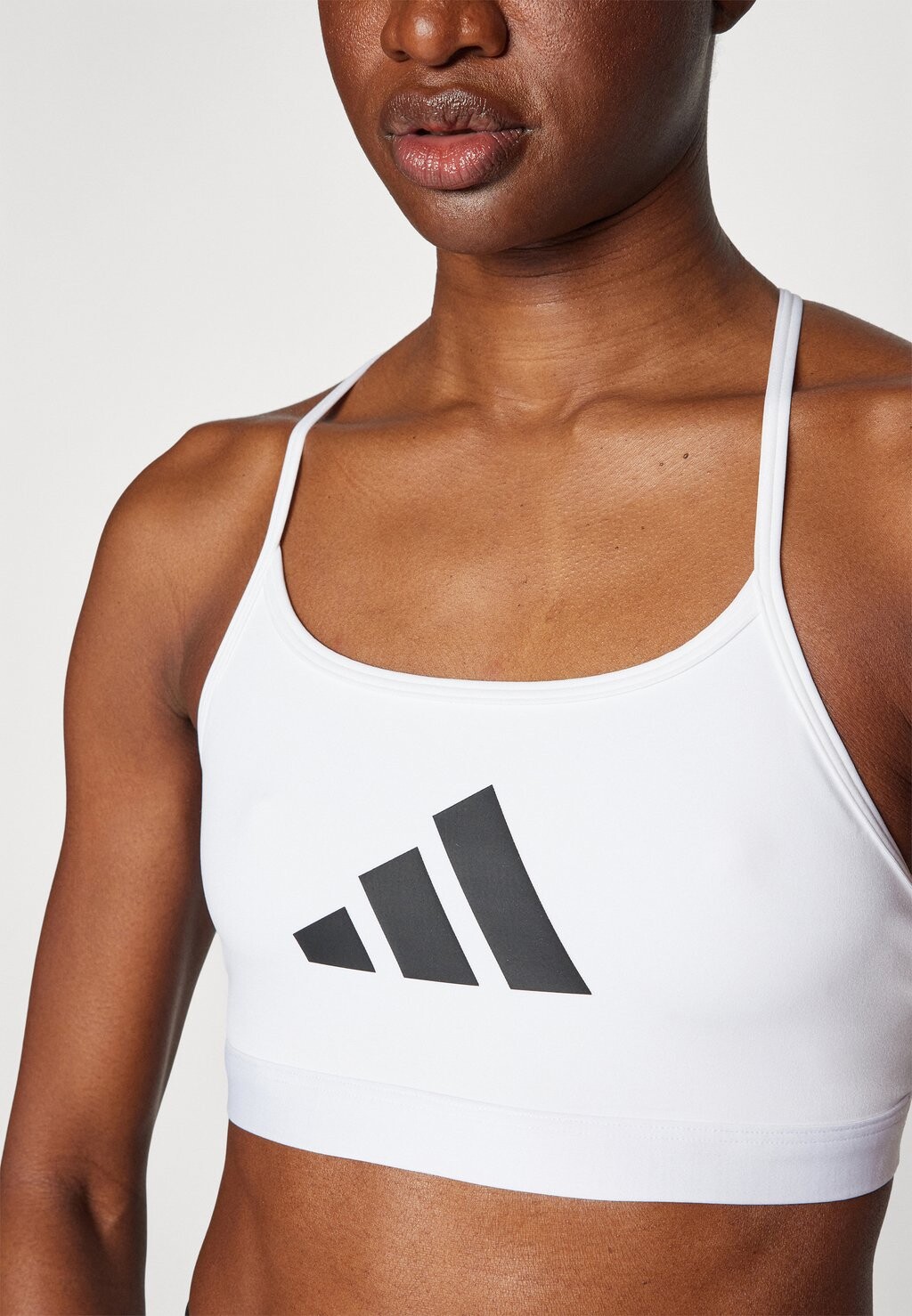 

Спортивный бюстгальтер с легкой поддержкой AEROREACT BIG GRAPHIC adidas, белый
