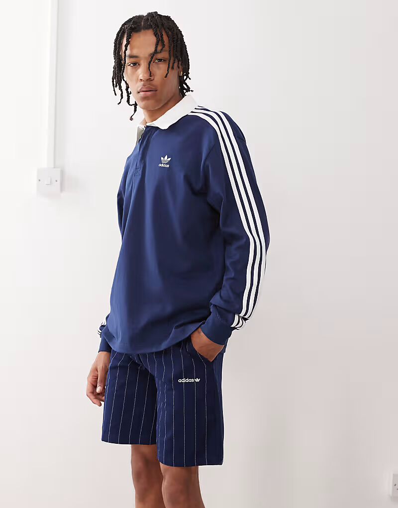 

Рубашка поло для регби Adidas Originals Adicolor в цвете ночной индиго/белый