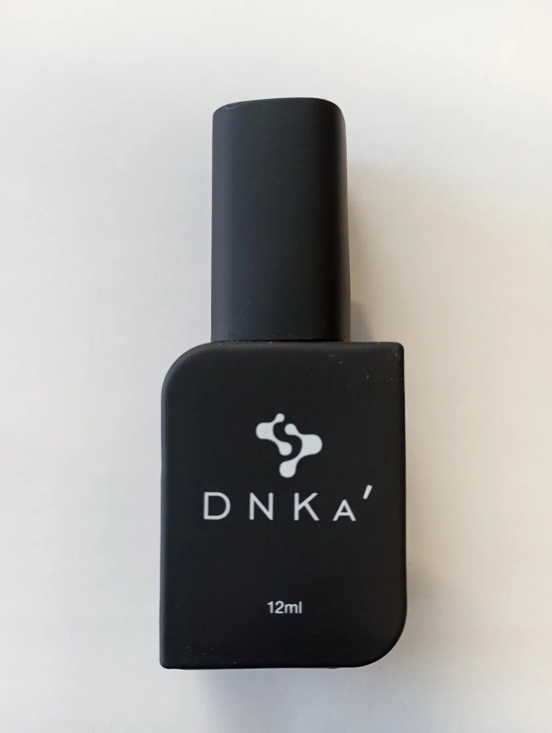 Топ для ногтей DNKA' Top No Wipe 12 мл без липкого слоя с УФ-фильтром Dnka'
