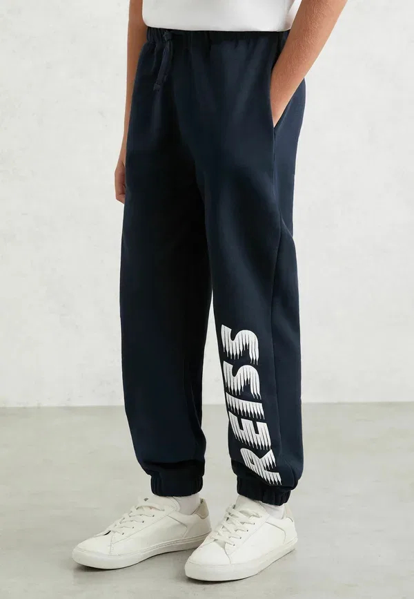 Спортивные штаны с манжетами Ruff logo print cuffed joggers tracksuit bottoms Reiss, темно-синий