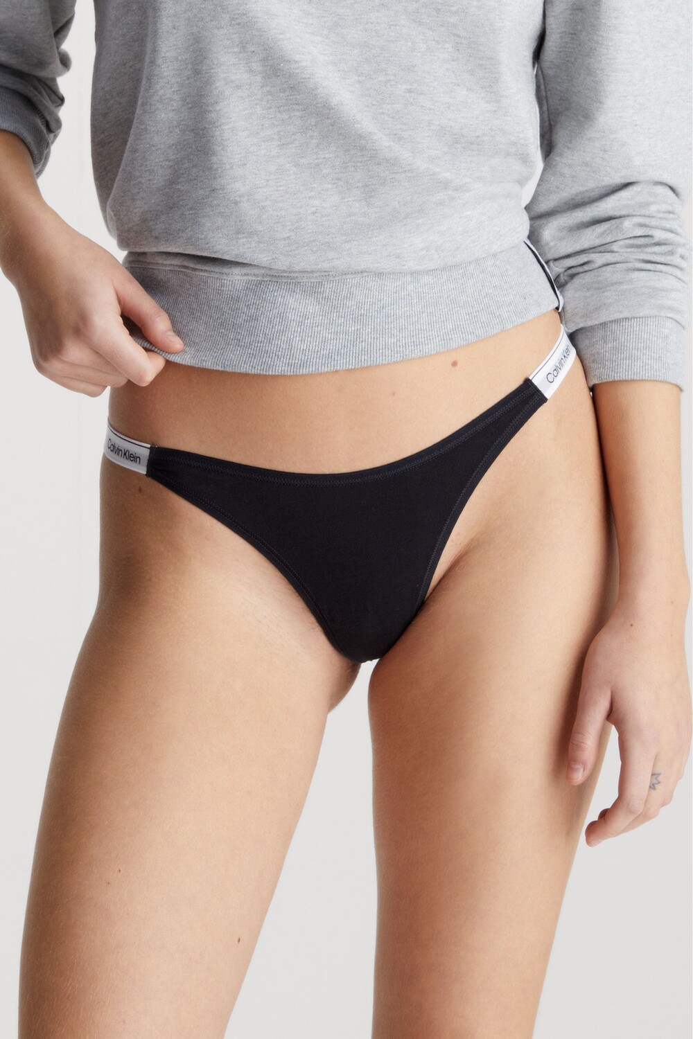 

Слоган «Струнные стринги» Calvin Klein, черный