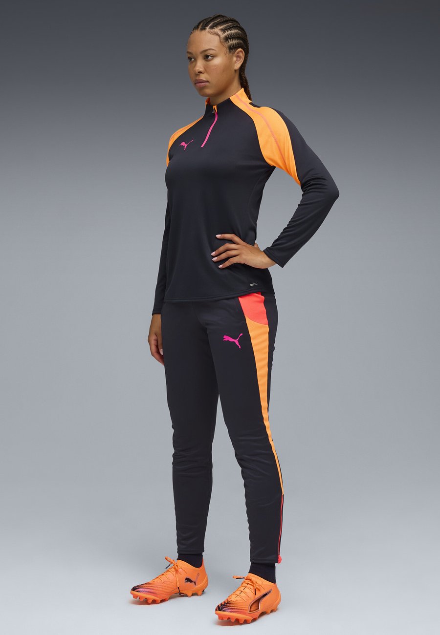 

Толстовка Puma INDIVIDUALBLAZE FUSSBALL MIT VIERTELLANGEM REISSVERSCHLUSS, New Navy-Ravish-Heat Fire/Blue