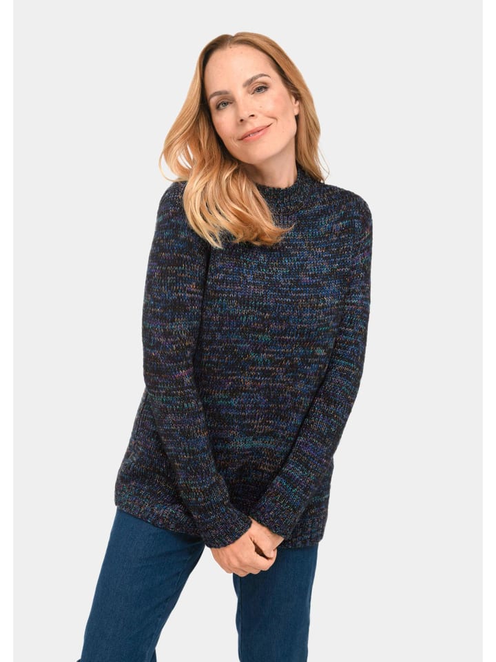 

Вязаный свитер. Удобный разноцветный свитер с яркими узорами. GOLDNER