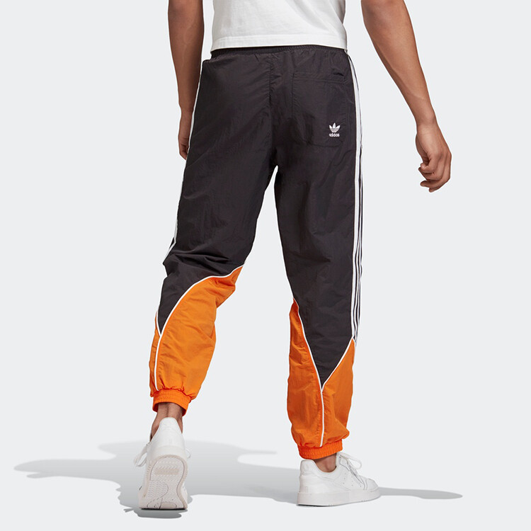 Мужские спортивные брюки Adidas Originals комбинированные, черно-оранжевый — фото 4