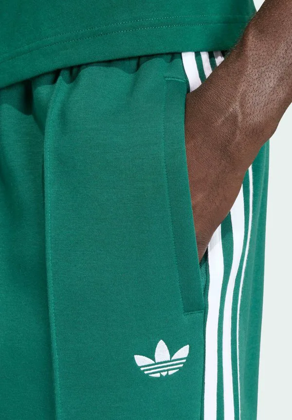 Разделительные тренировочные штаны от спортивного костюма Adidas Originals, Collegiate Green — фото 3