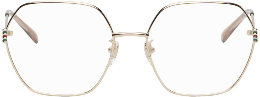 

Золотые большие очки с геометрическим рисунком Gucci