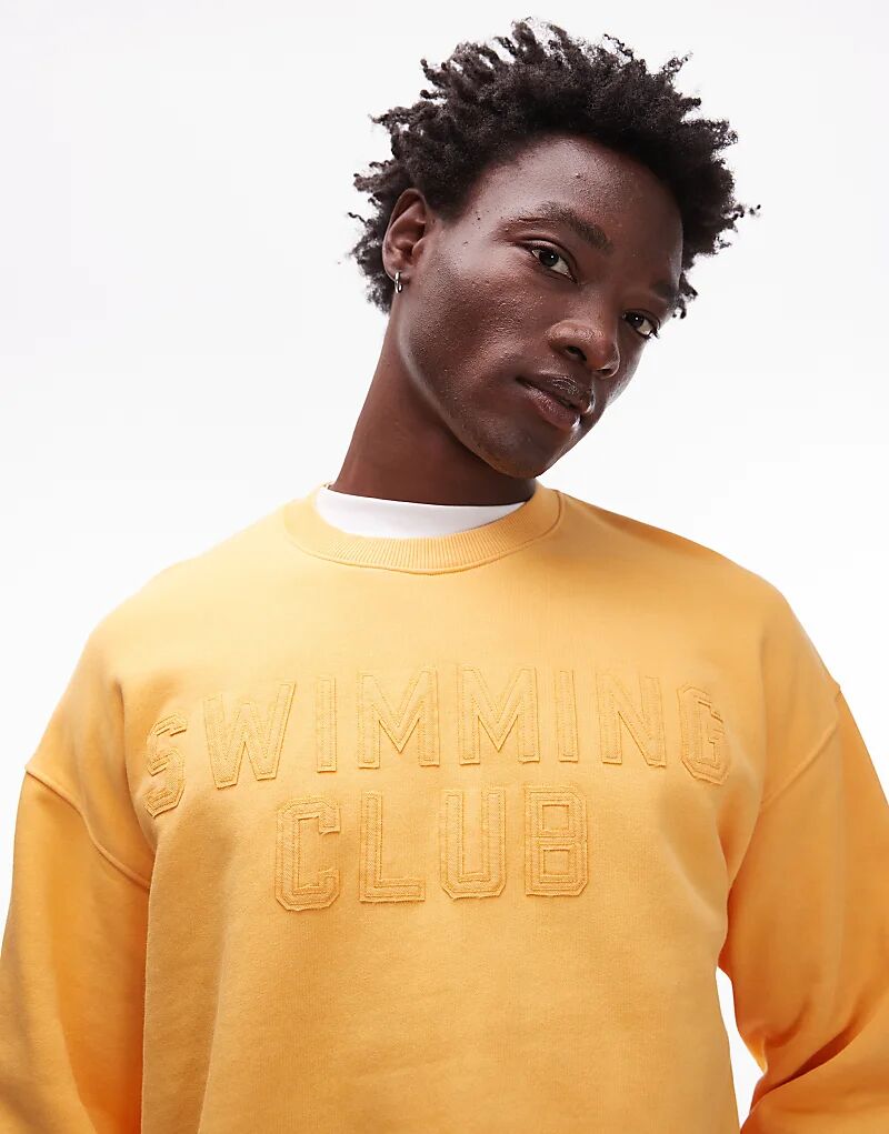 

Толстовка Topman свободного кроя с вышивкой плавательного клуба в выбеленном оранжевом цвете