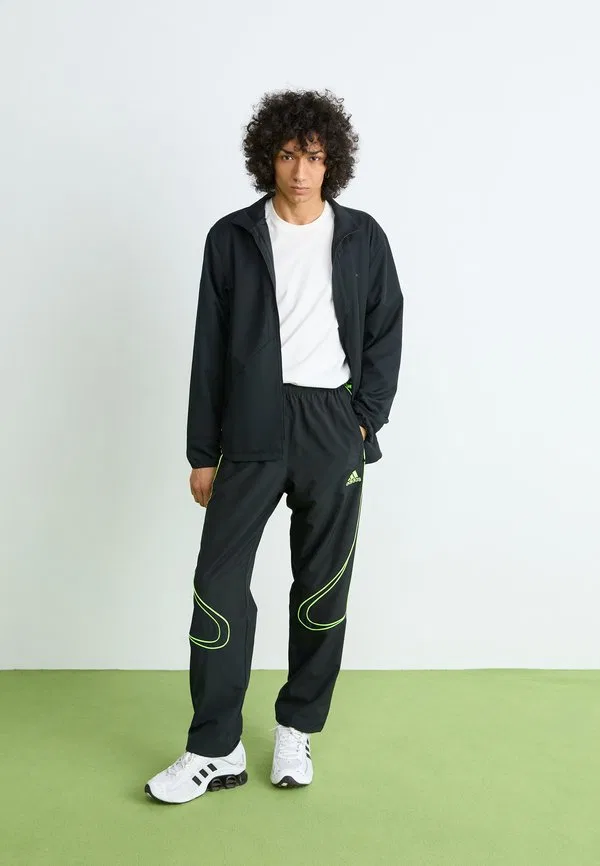 Спортивные штаны teamgeist Adidas Originals, Black/Signal Green — фото 4