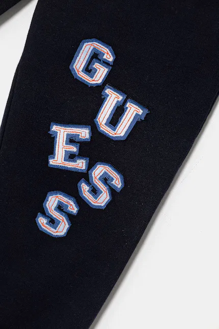 Спортивные штаны детские из хлопка Guess, синий — фото 3