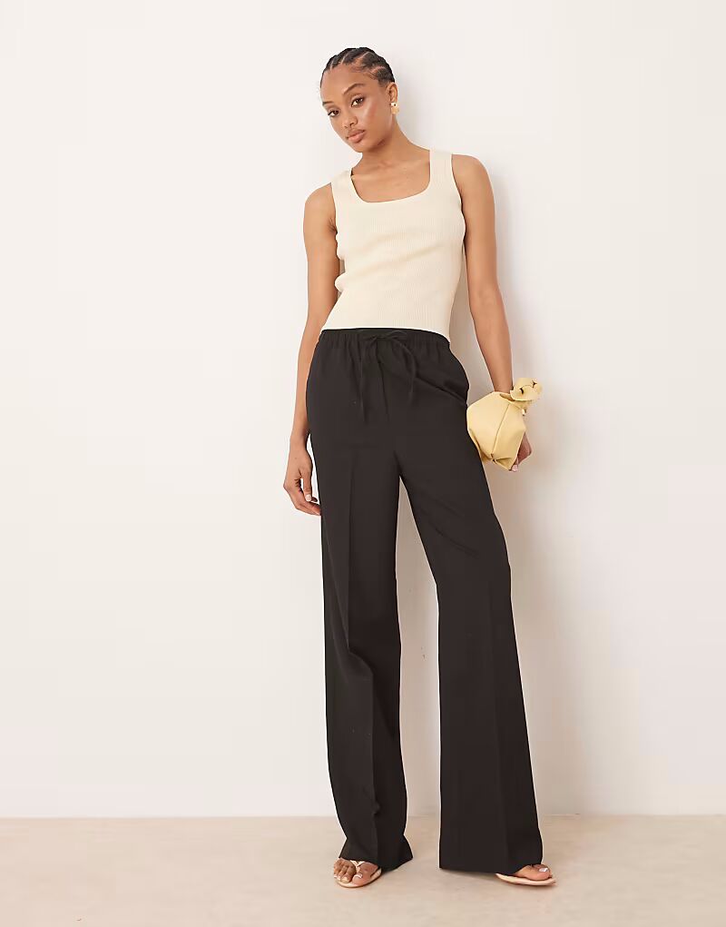 

ASOS DESIGN Высокие брюки-клеш черного цвета