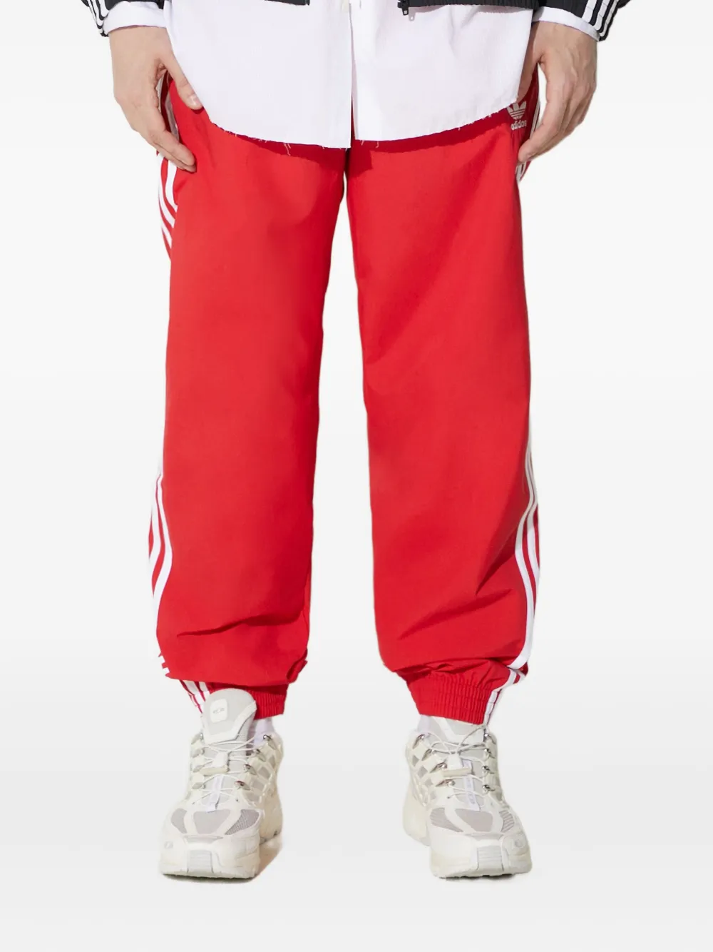 

Трикотажные брюки с тремя полосками adidas, красный