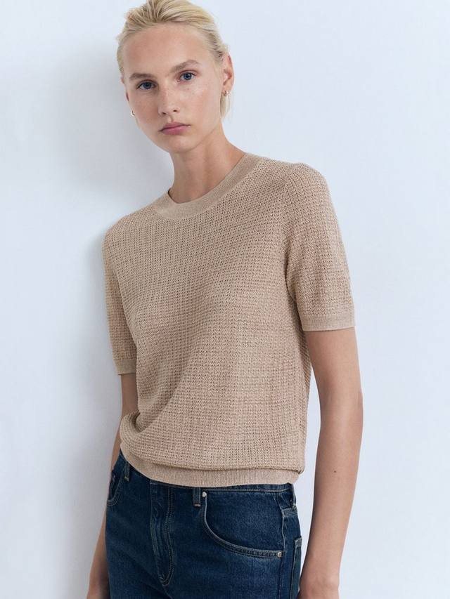 

Блестящий джемпер с круглым вырезом и короткими рукавами Mango