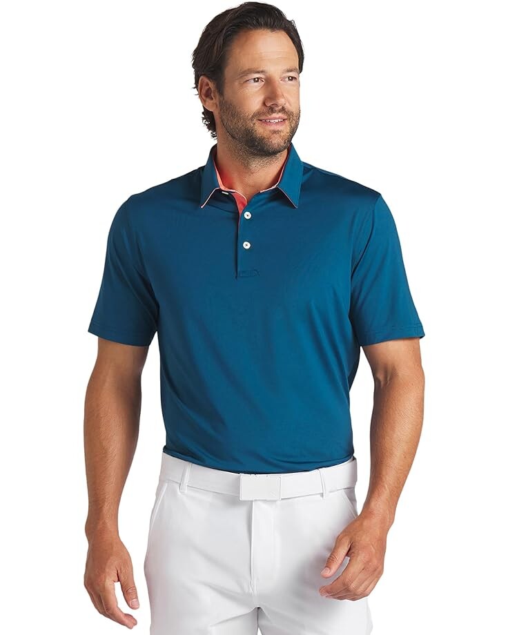 

Поло PUMA Golf Mattr Brigade, цвет Ocean Tropic/Melon Punch
