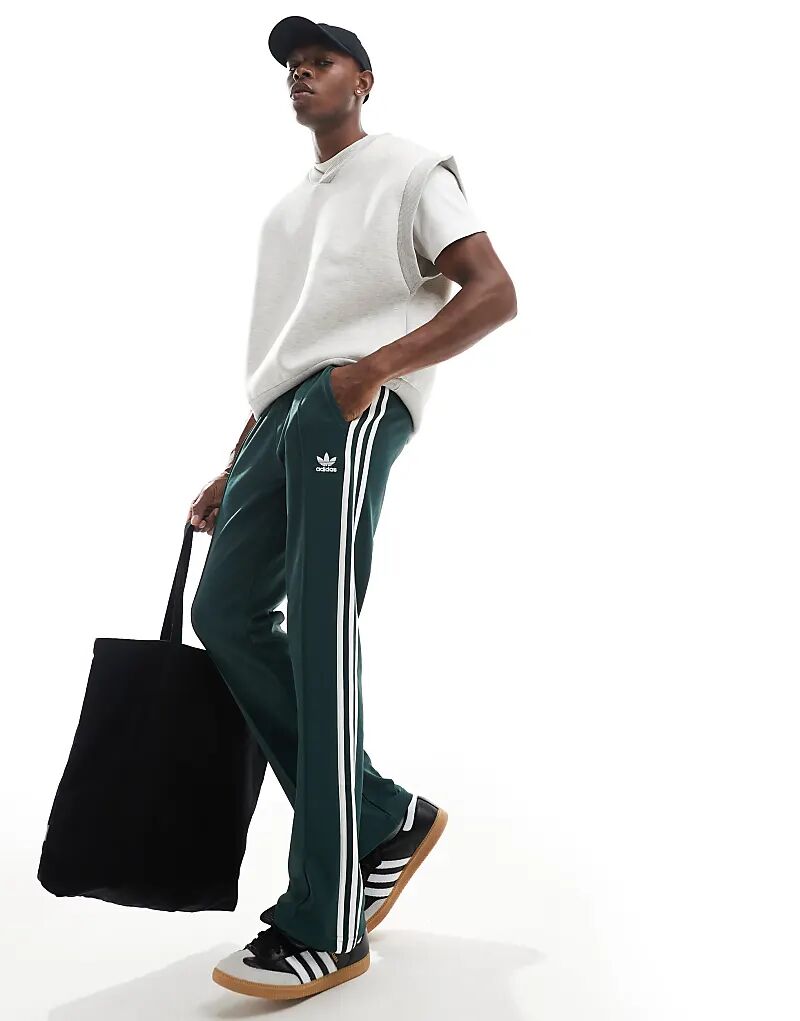 

Спортивные брюки в стиле 70-х годов цвета «минеральный зеленый» adidas Originals