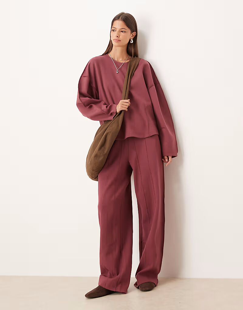 

Широкие брюки-джоггеры из интерлока с декоративными швами темно-розового цвета Asos Design