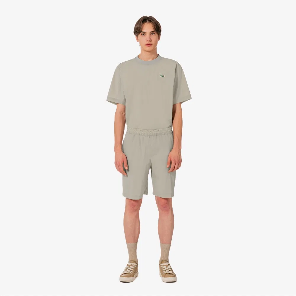 Мужские теннисные тканые шорты-комплект бежевые от Lacoste — фото 4