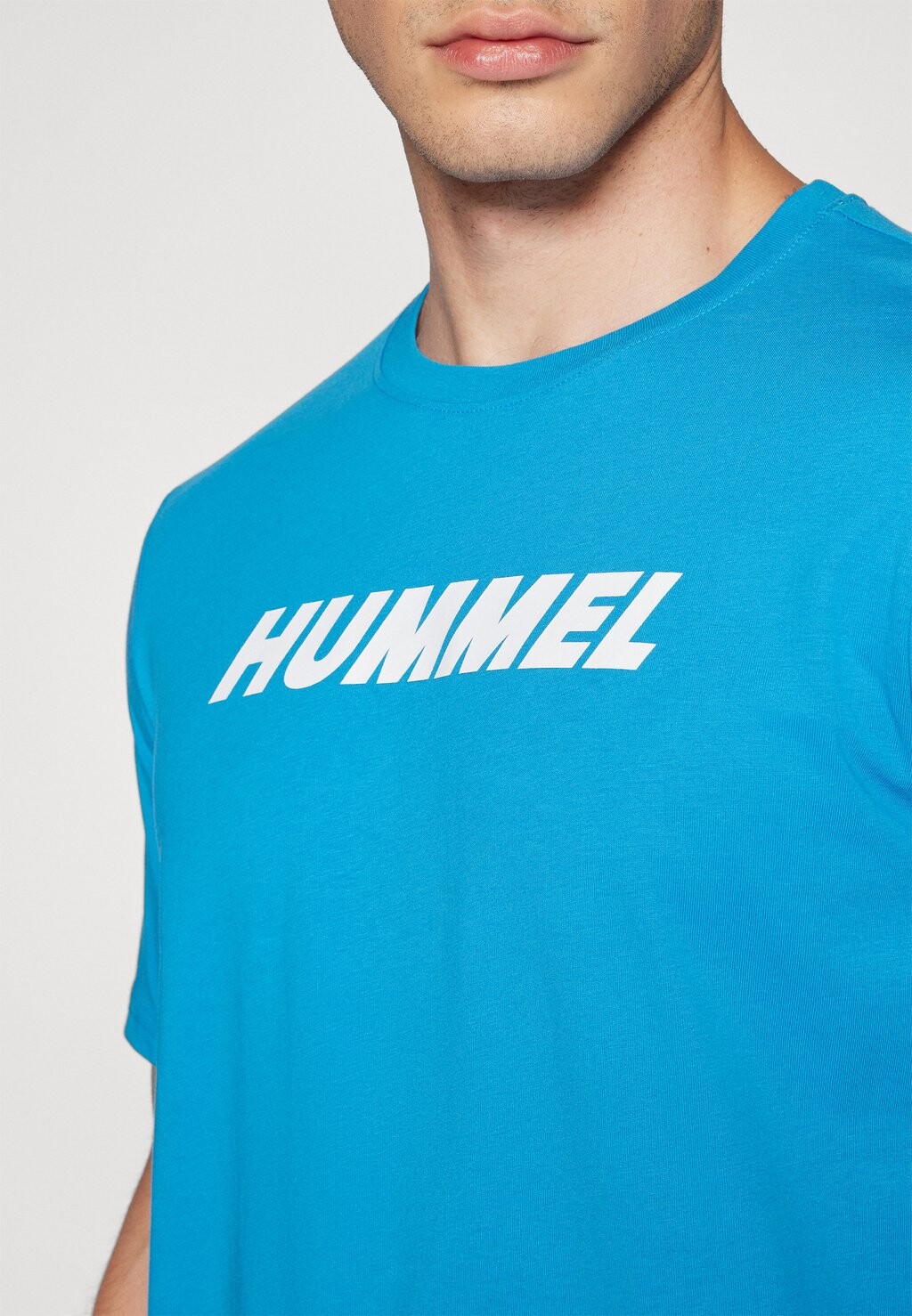 

Принт на футболке ELEMENTAL LOGO TEE Hummel, светло-голубой