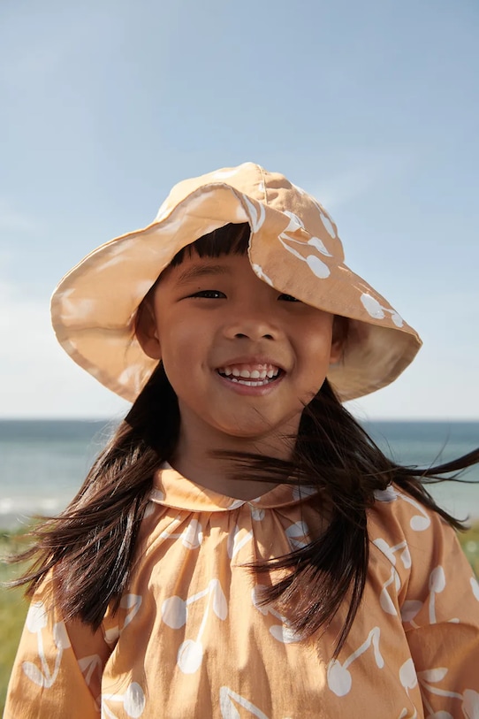 

Детская двусторонняя панама Amelia Reversible Sun Hat Liewood, оранжевый