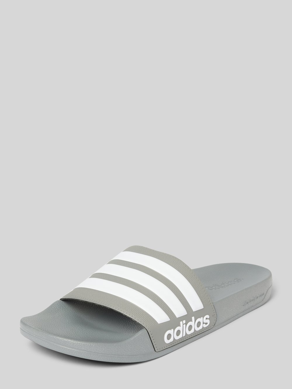 

Слайды с этикеткой, модель «ADILETTE SHOWER» ADIDAS SPORTSWEAR