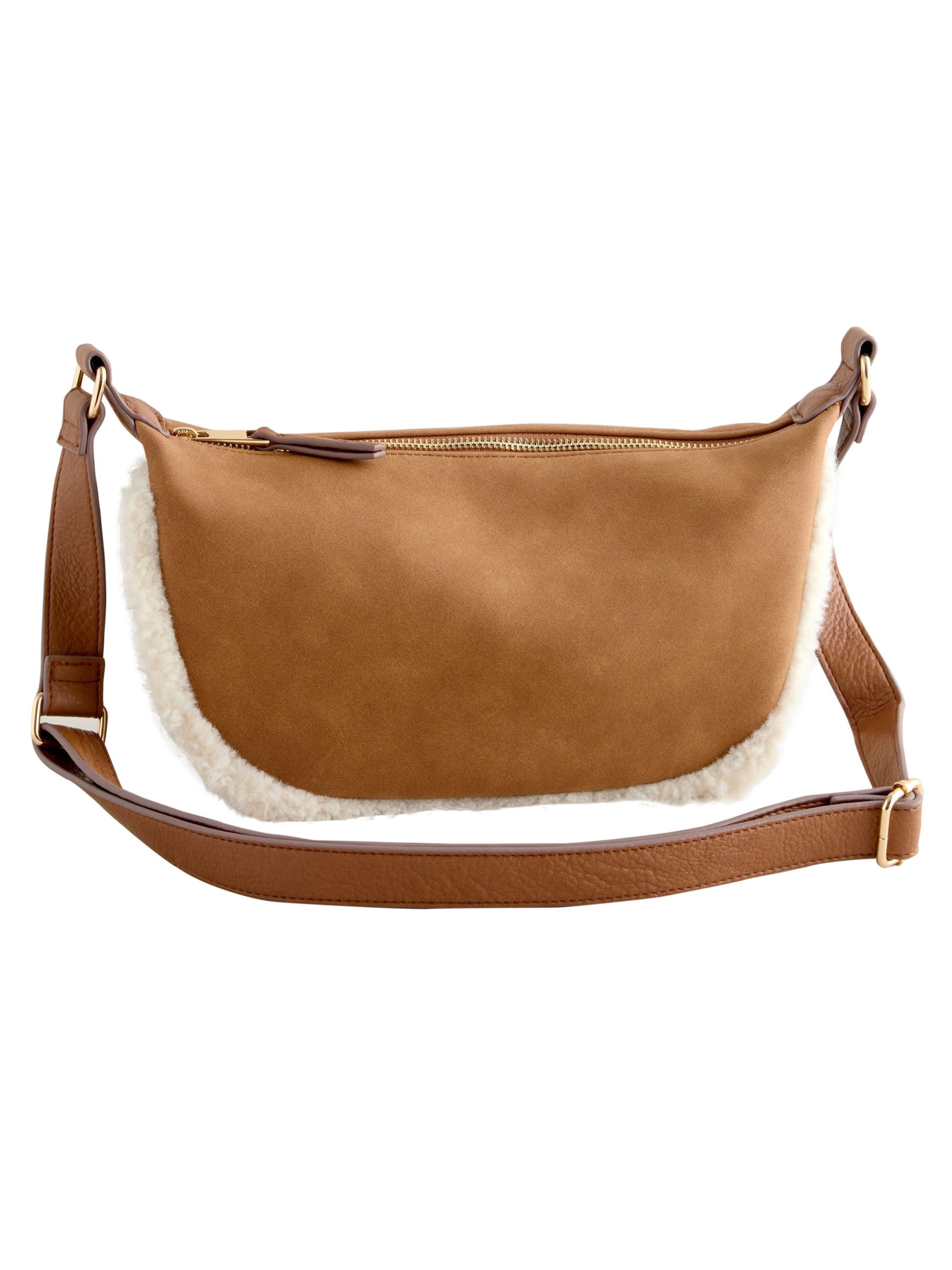 

Next Сумка через плечо в коричневом цвете