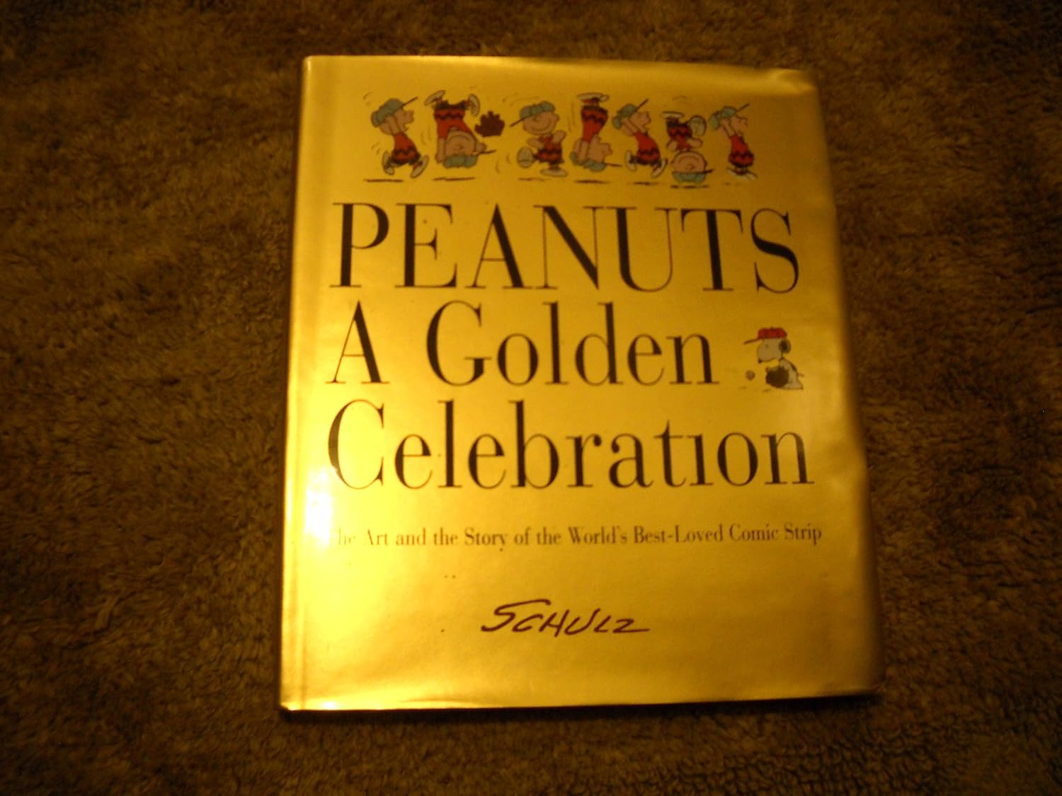 

Peanuts: A Golden Celebration: The Art and the Story of the World's Best-Loved Comic Strip (HarperCollins)