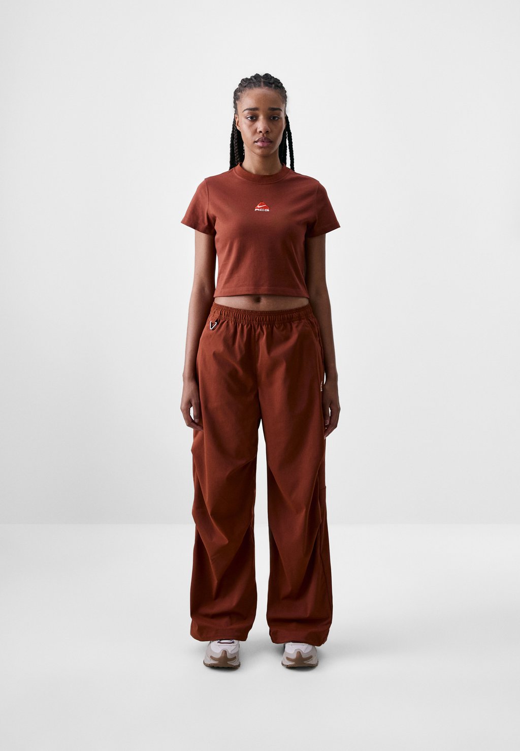 

Спортивные штаны ACTIVITORIUM PANT Nike ACG, коричневый