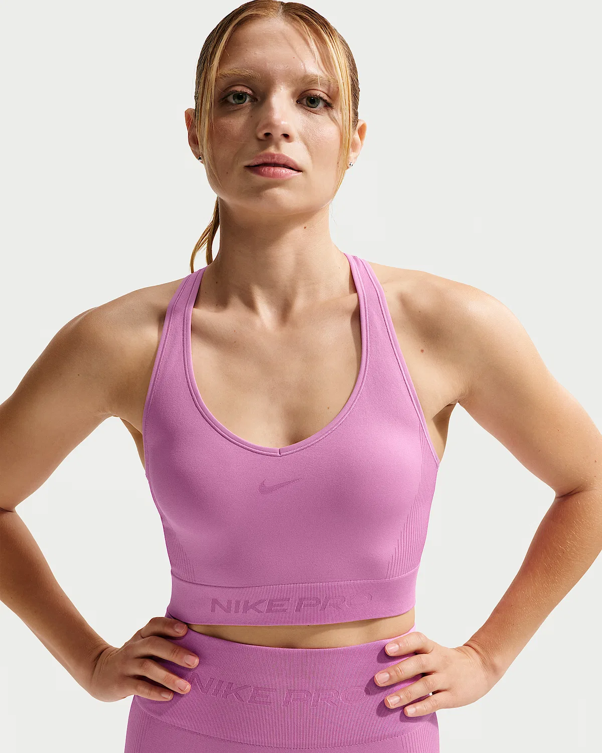 Женский топ Nike Pro Seamless Dri-FIT с укороченным кроем, Light Magenta