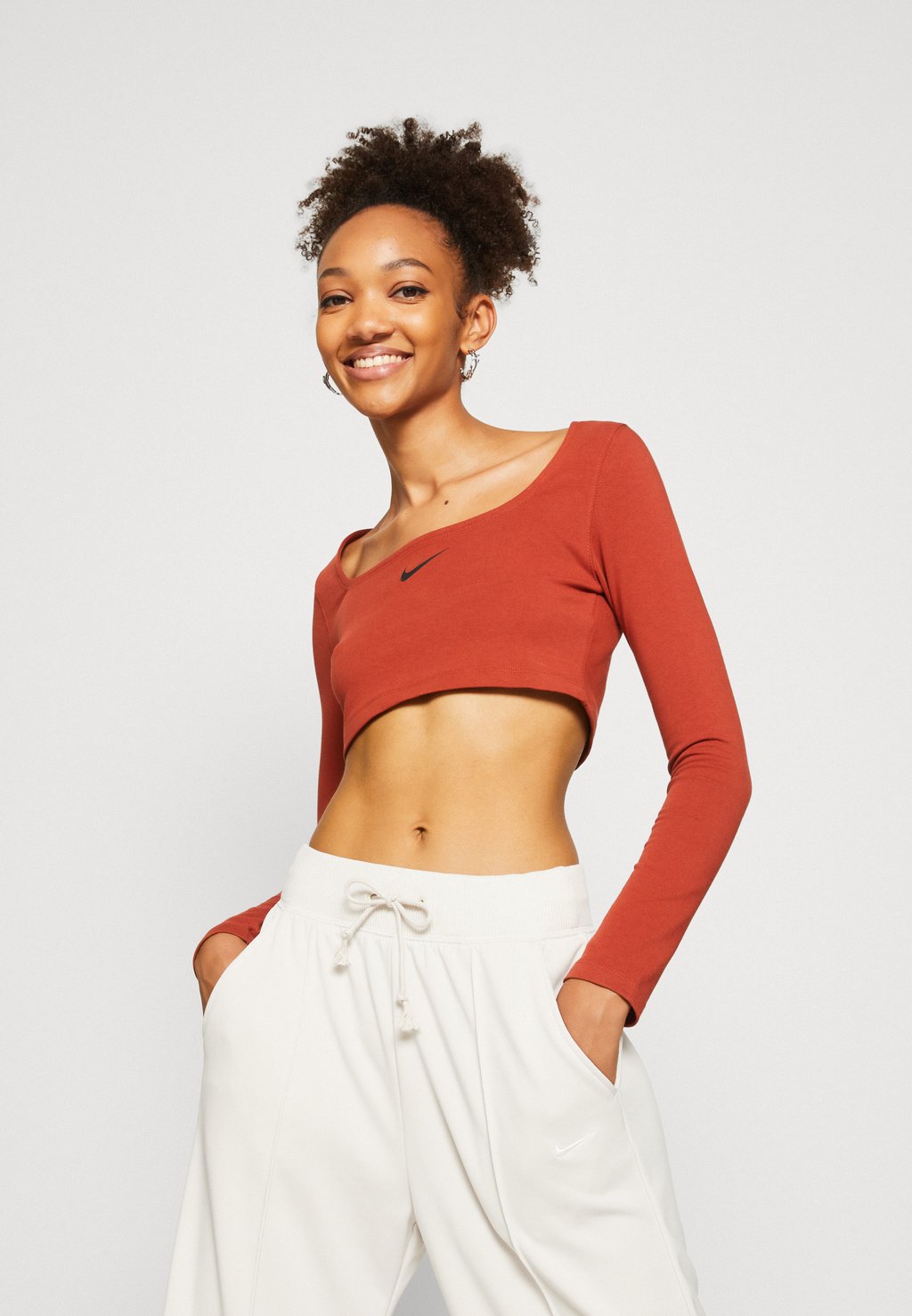 

Топ с длинными рукавами W NSW LS CROP TOP SW Nike Sportswear, оранжевый