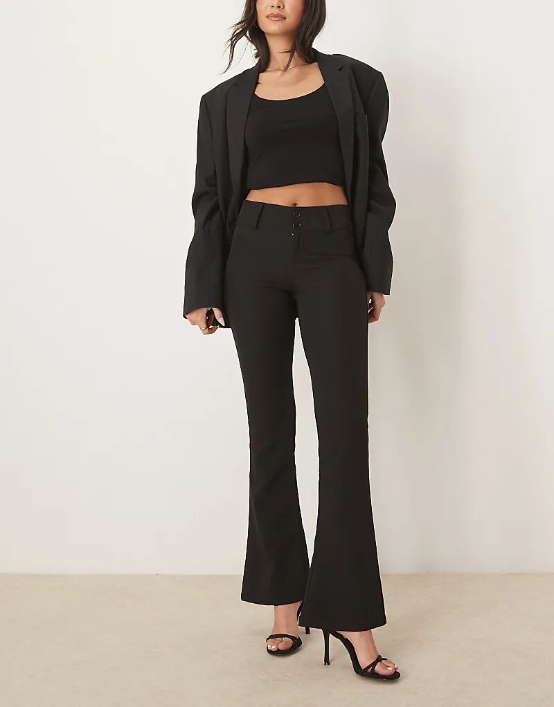 

Расклешенные брюки-стрейч Gina Tricot с низкой посадкой, черного цвета