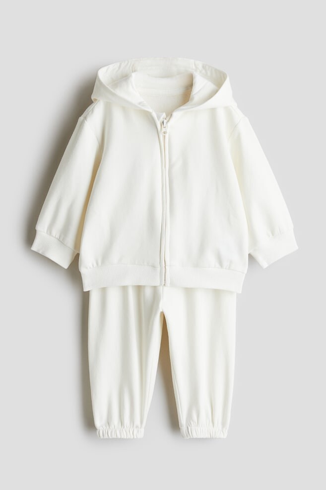 

Костюм двойка с курткой худи и спортивными брюками H&M, белый