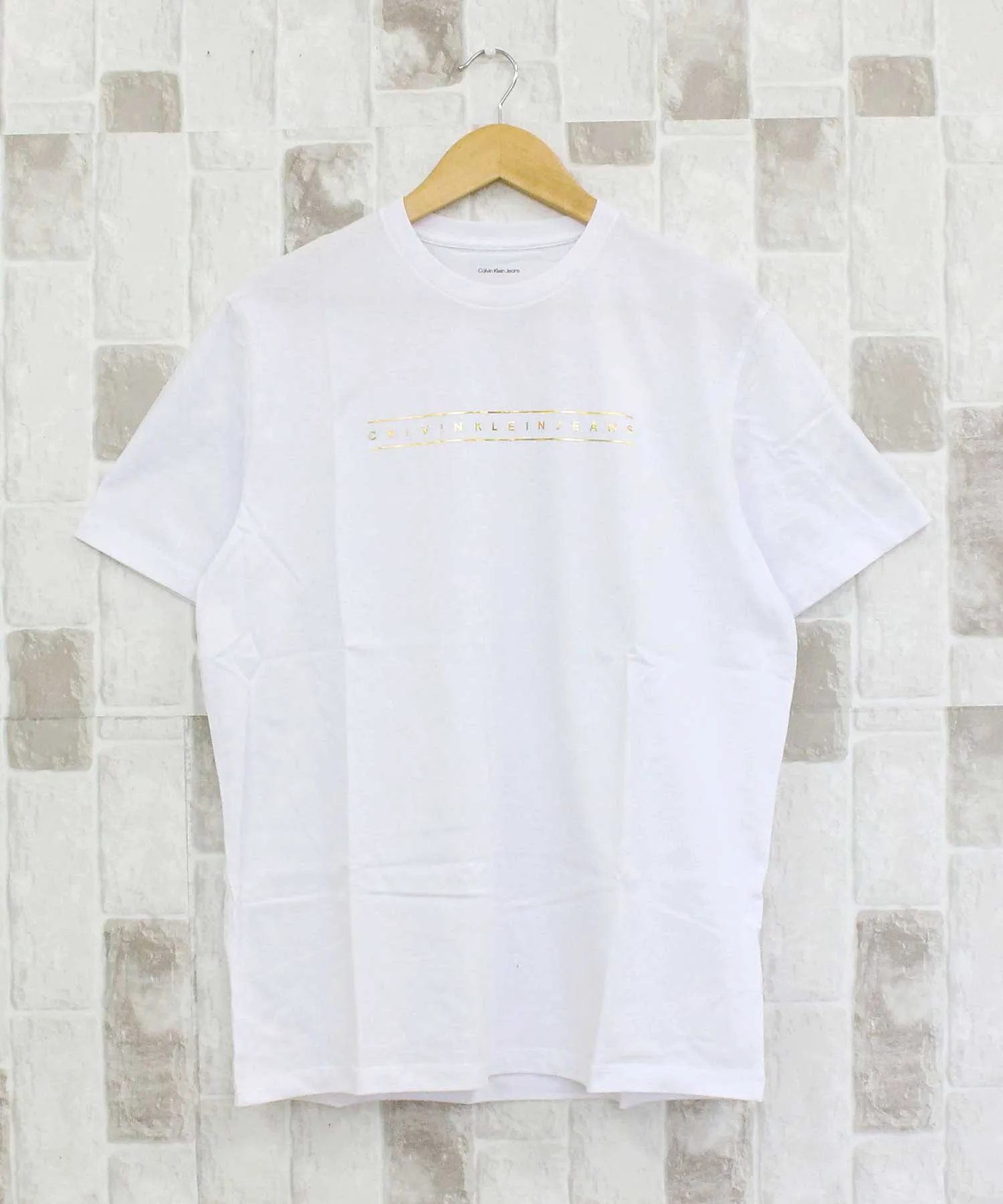 Унисекс футболка с золотистым принтом Calvin Klein BRILLIANT WHITE
