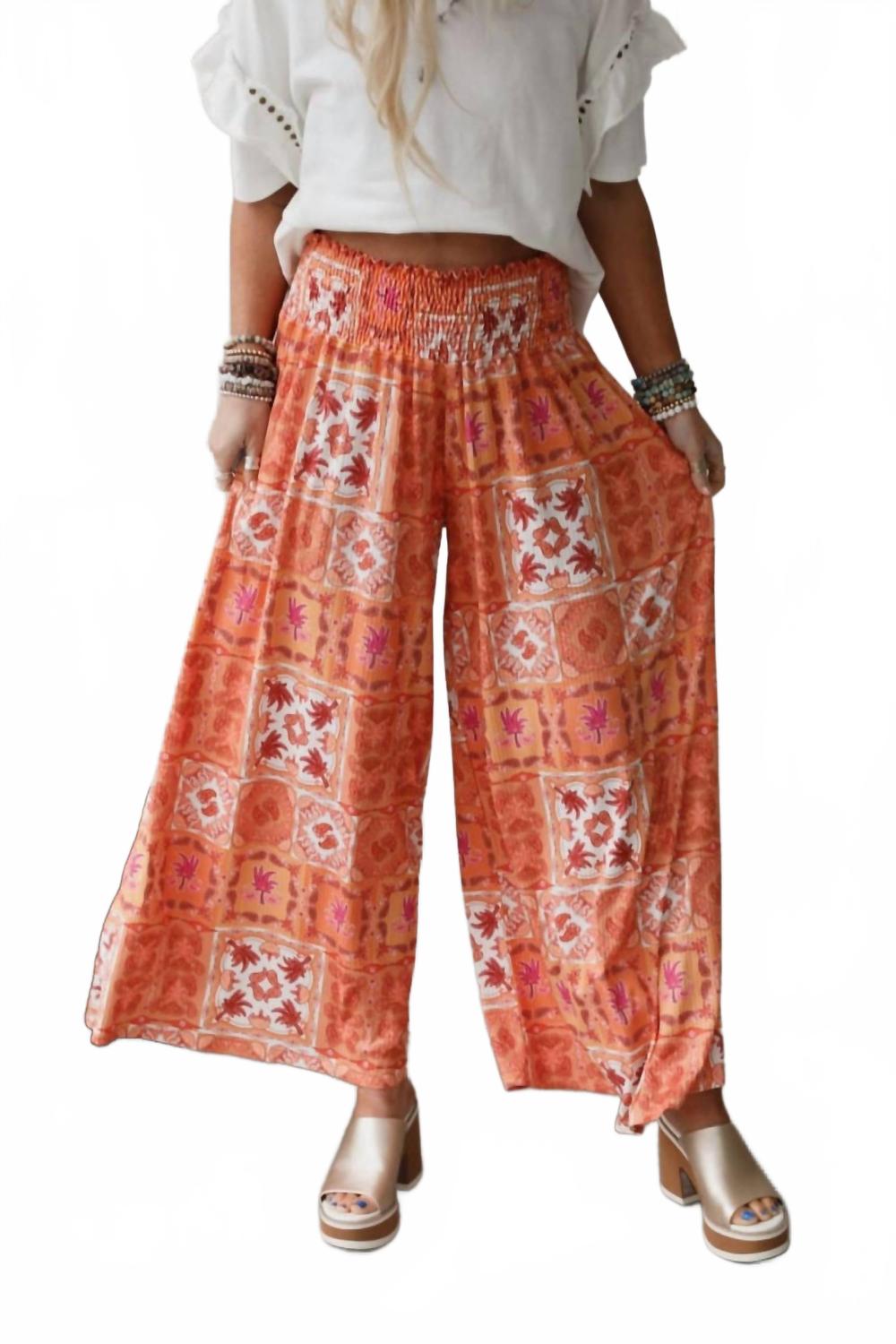 

Свободные широкие брюки в оранжевом цвете Three bird nest