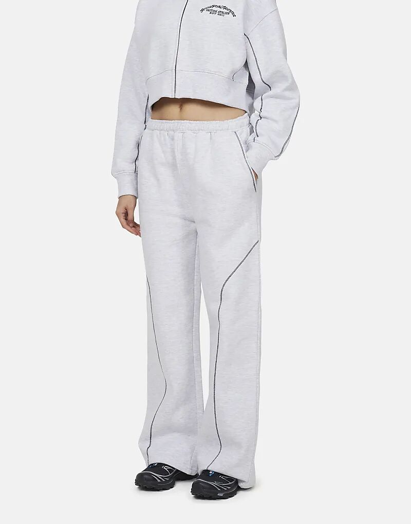 

Бесполезные мешковатые спортивные брюки с коверлоком серого цвета