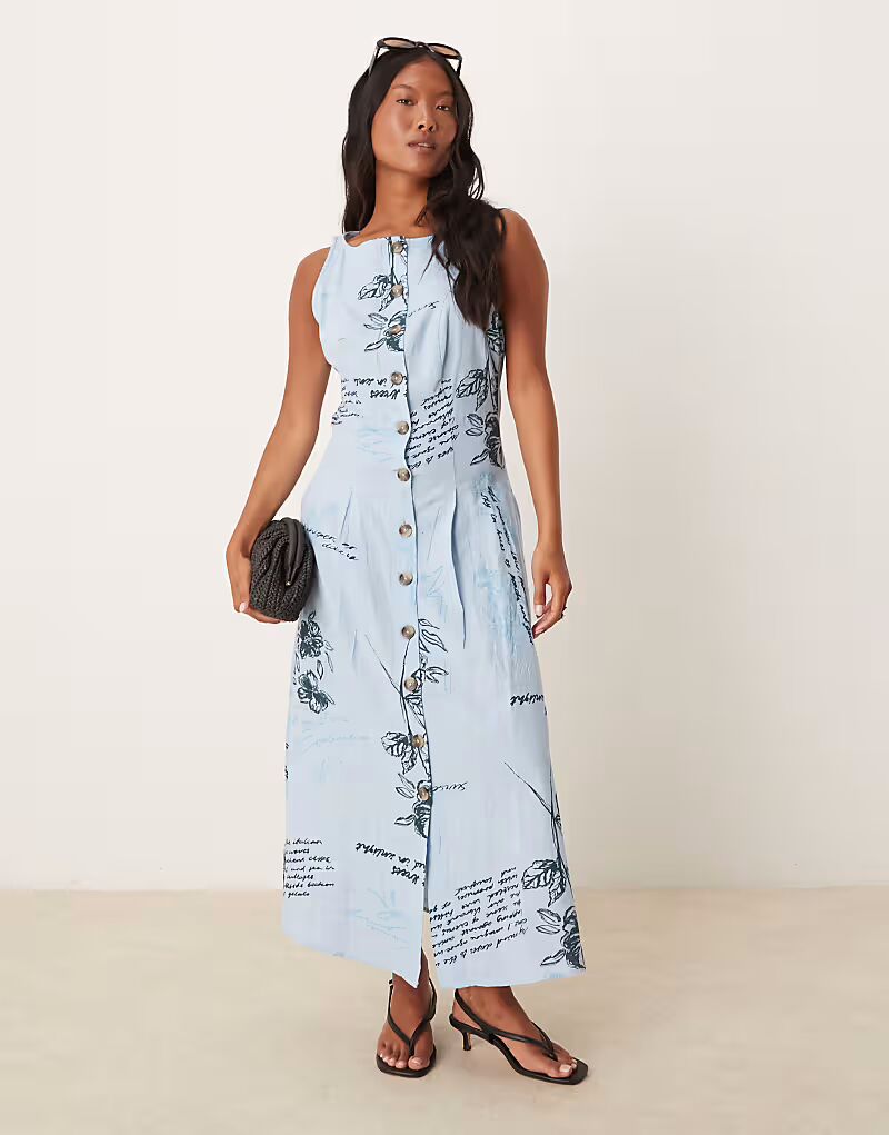 

Платье-миди ASOS DESIGN Petite с вырезом-лодочкой на пуговицах и жилетом синего цвета с цветочным принтом ASOS Petite