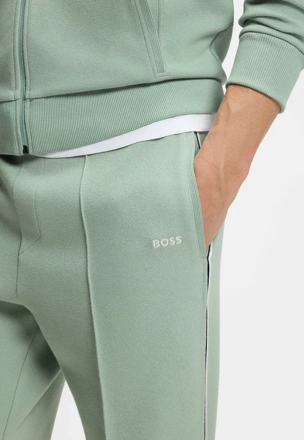 Штаны спортивные Hadiko tracksuit bottoms Boss, открытый зелёный — фото 4