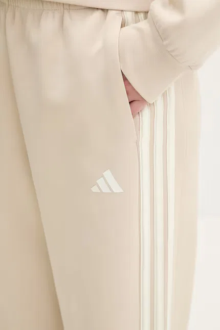 Спортивные штаны из футера модель Stadium Adidas, бежевый — фото 4