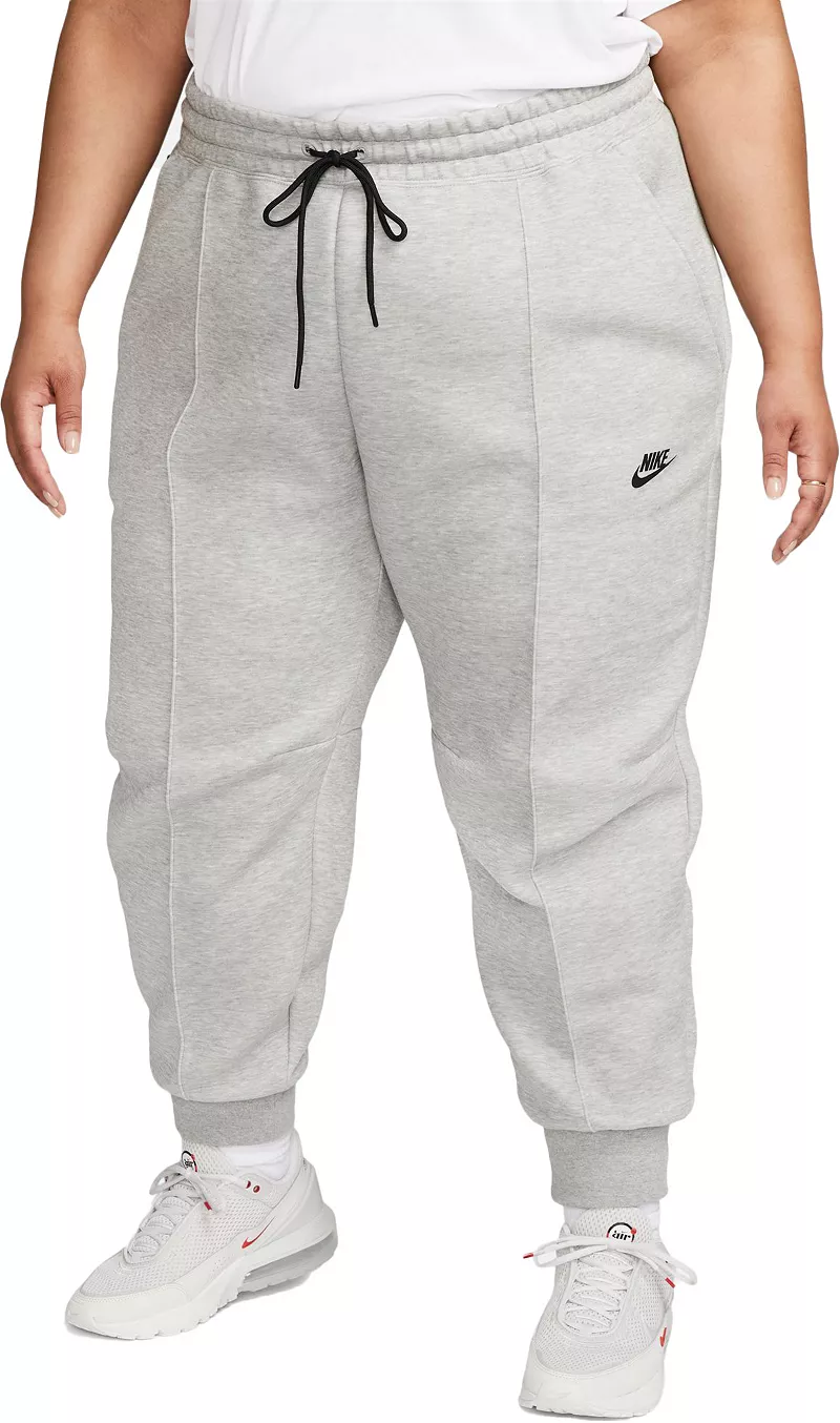 

Женские джоггеры из технического флиса Nike Sportswear со средней посадкой (большие размеры), цвет Dk Grey Heather