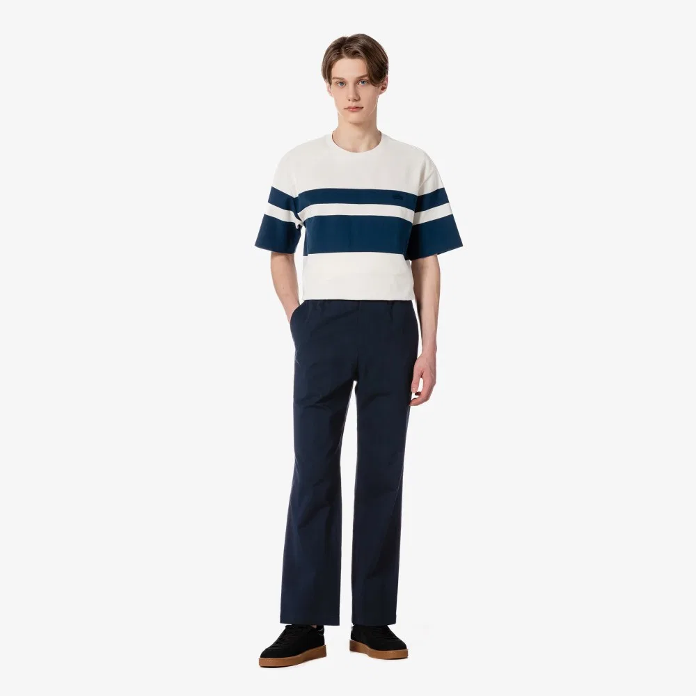 Мужские тёмно-синие брюки из смесового льна от Lacoste